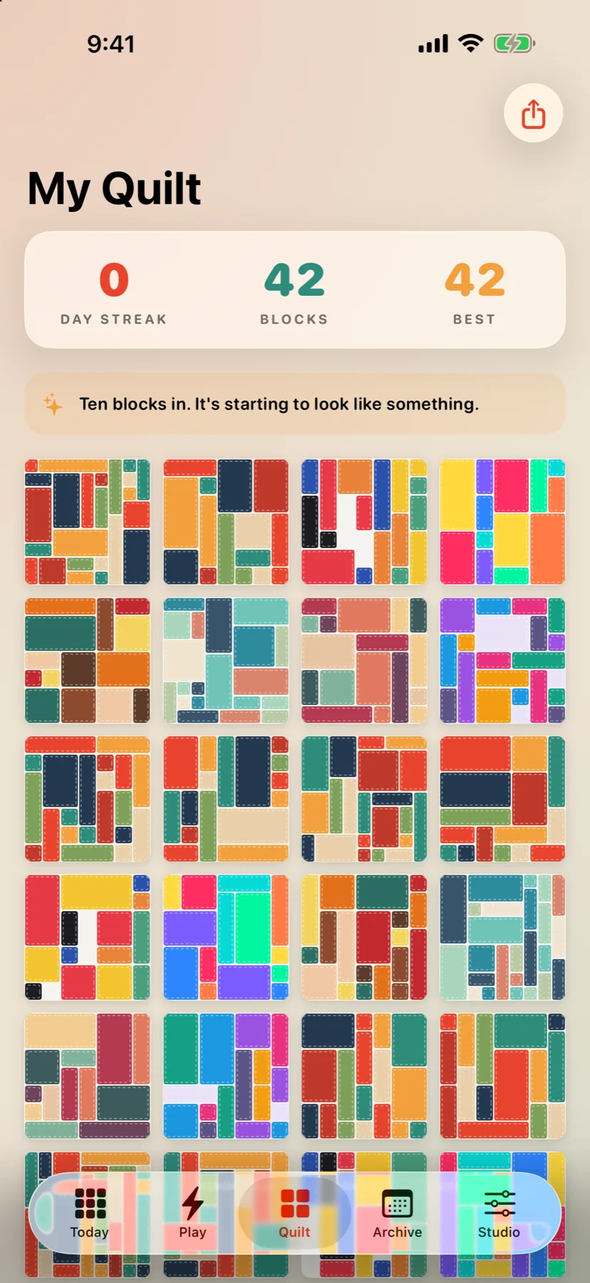 A colorful quilt made from completed Coverlet puzzles